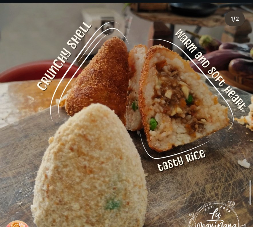 Sicilian arancini with a crunchy shell and soft rice heart
