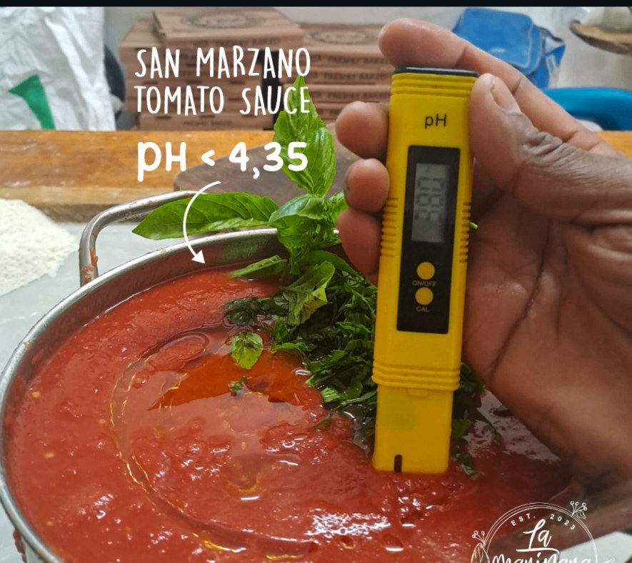 Ripe Italian tomatoes crushed for the sauce at La Marinara