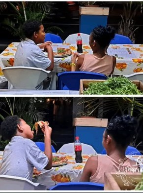 A family sharing pizza at the tables of La Marinara in Grand Baie (Mauritius)